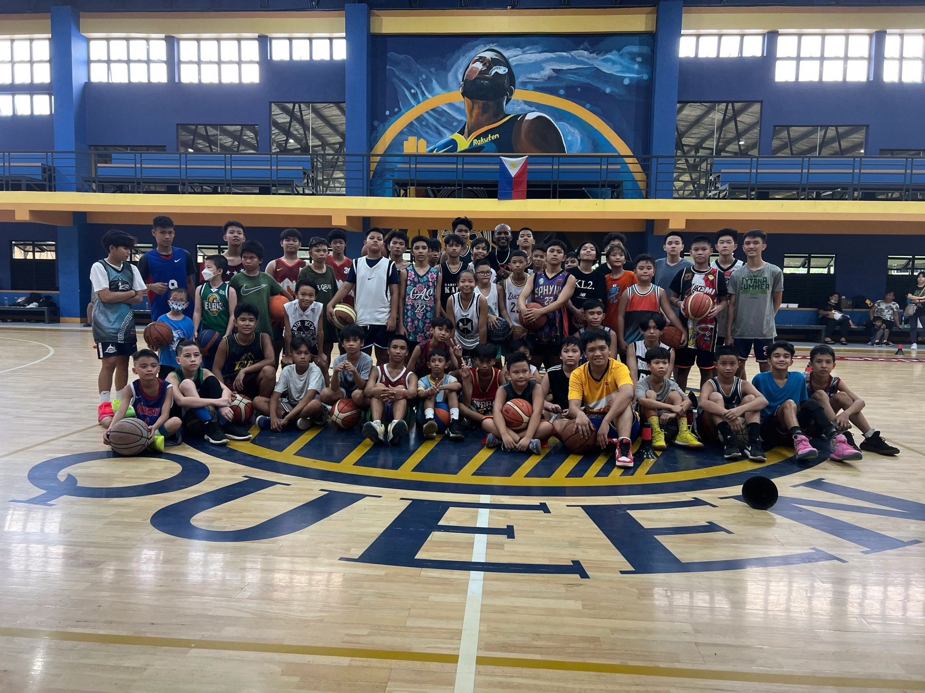 Camp group photo in a Philippine gym