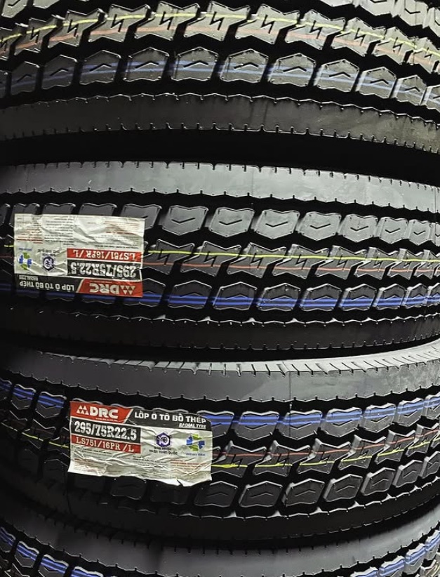 Stacked commercial truck tires in 295/75R22.5