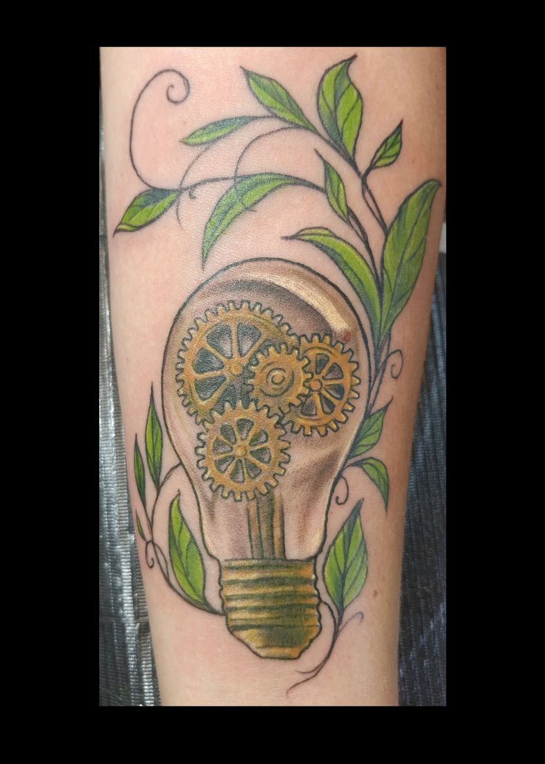 Lightbulb with flowers tattoo