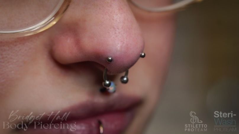 Curated gold ear piercings