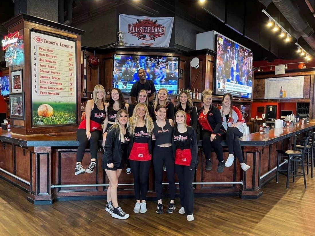 Fans at the bar under the TVs at Holy Grail