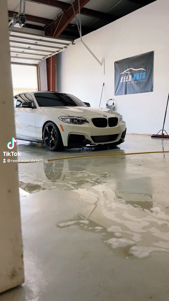 White BMW 2 Series during a detail