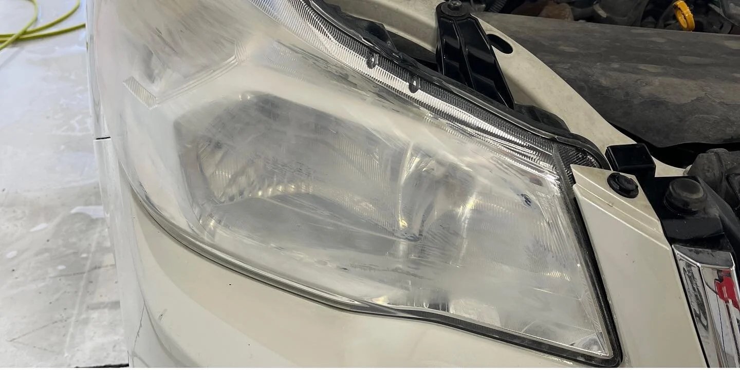 Hazy, oxidized headlight before restoration