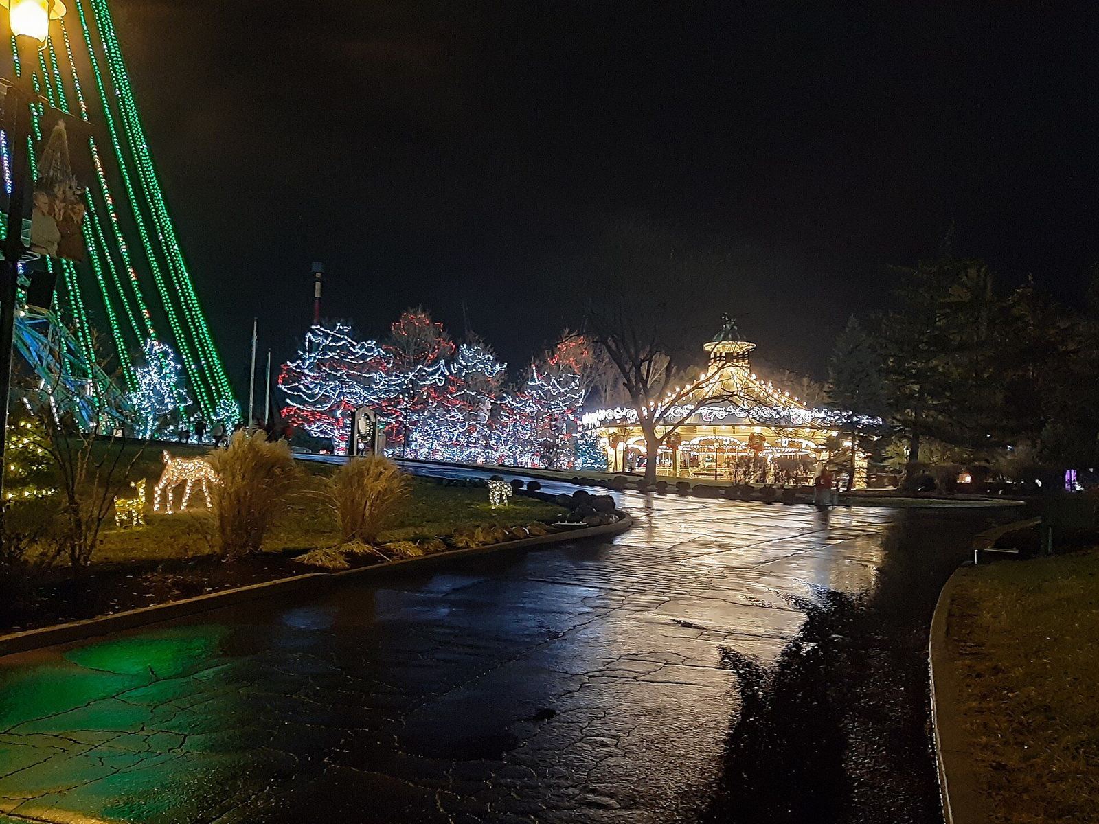 Kings Island's Eiffel Tower and carousel during WinterFest